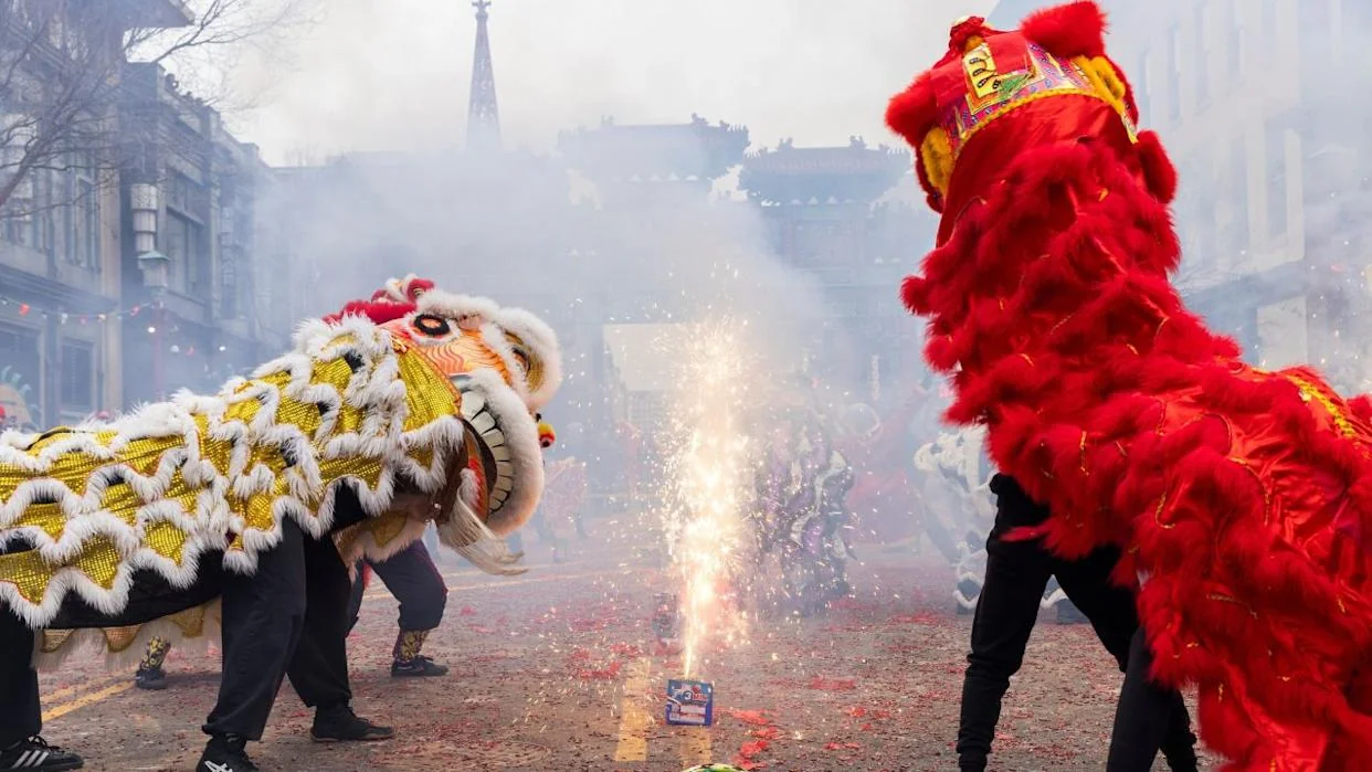 The nation’s capital celebrates with a vibrant parade in Chinatown featuring traditional Chinese zodiac characters.