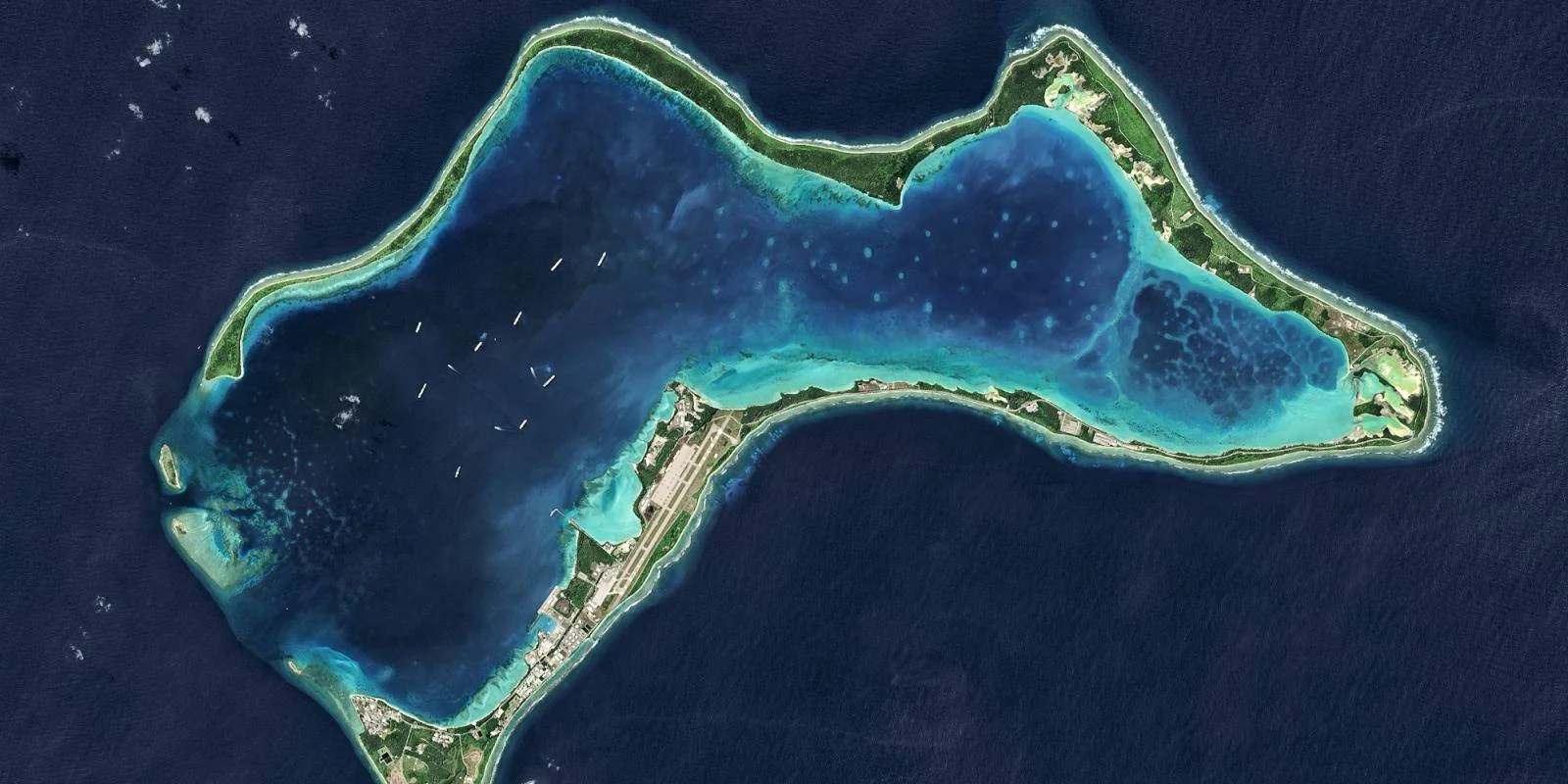 Image — Diego Garcia, the largest of the islands in the Chagos Archipelago. (Photo by USGS/NASA Landsat data/Orbital Horizon Gallo Images/Gallo Images/Getty Images)