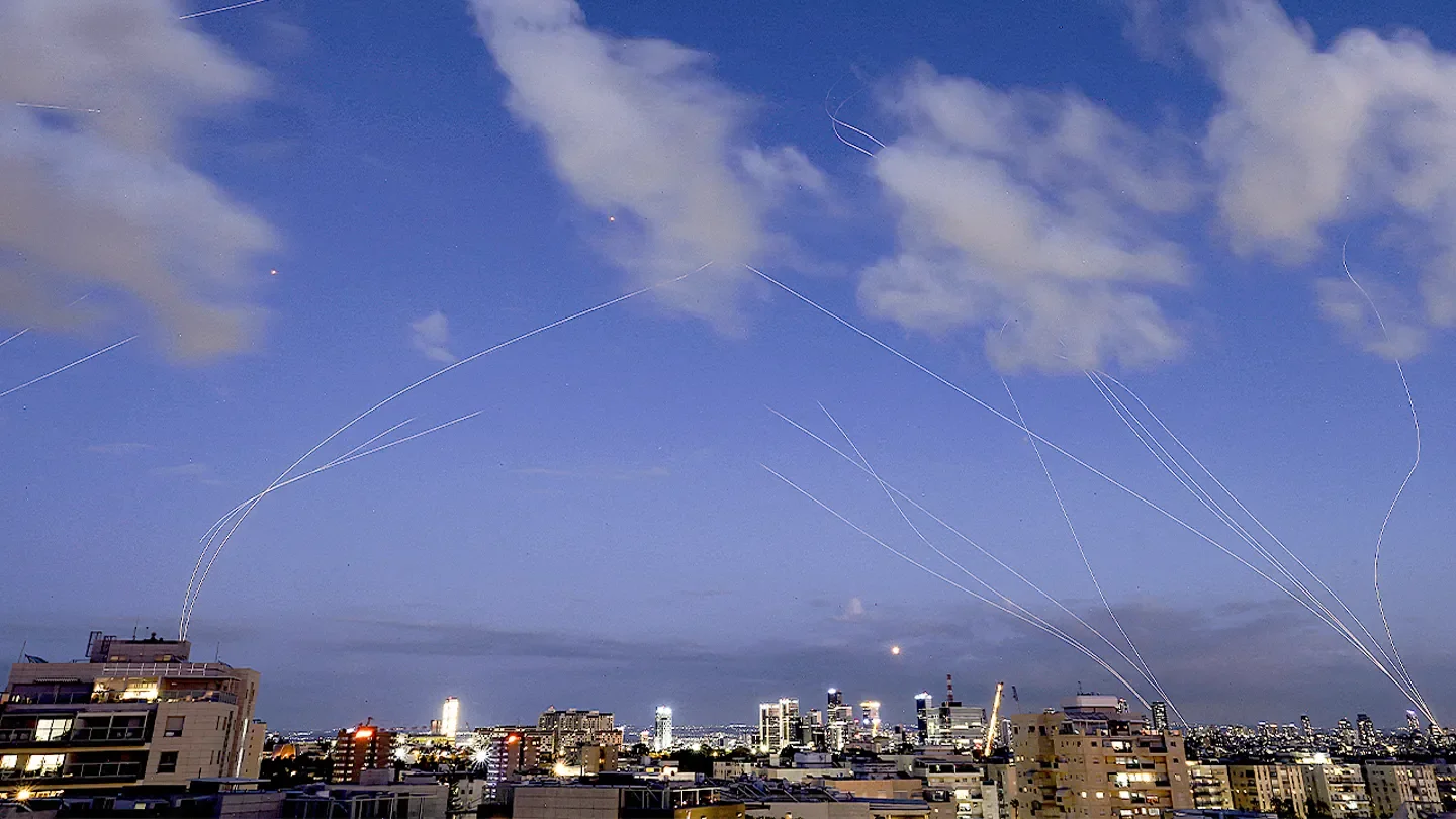 Explosions from projectile interceptions by Israel's Iron Dome missile defence system over Tel Aviv. (JACK GUEZ / AFP via Getty Images)
