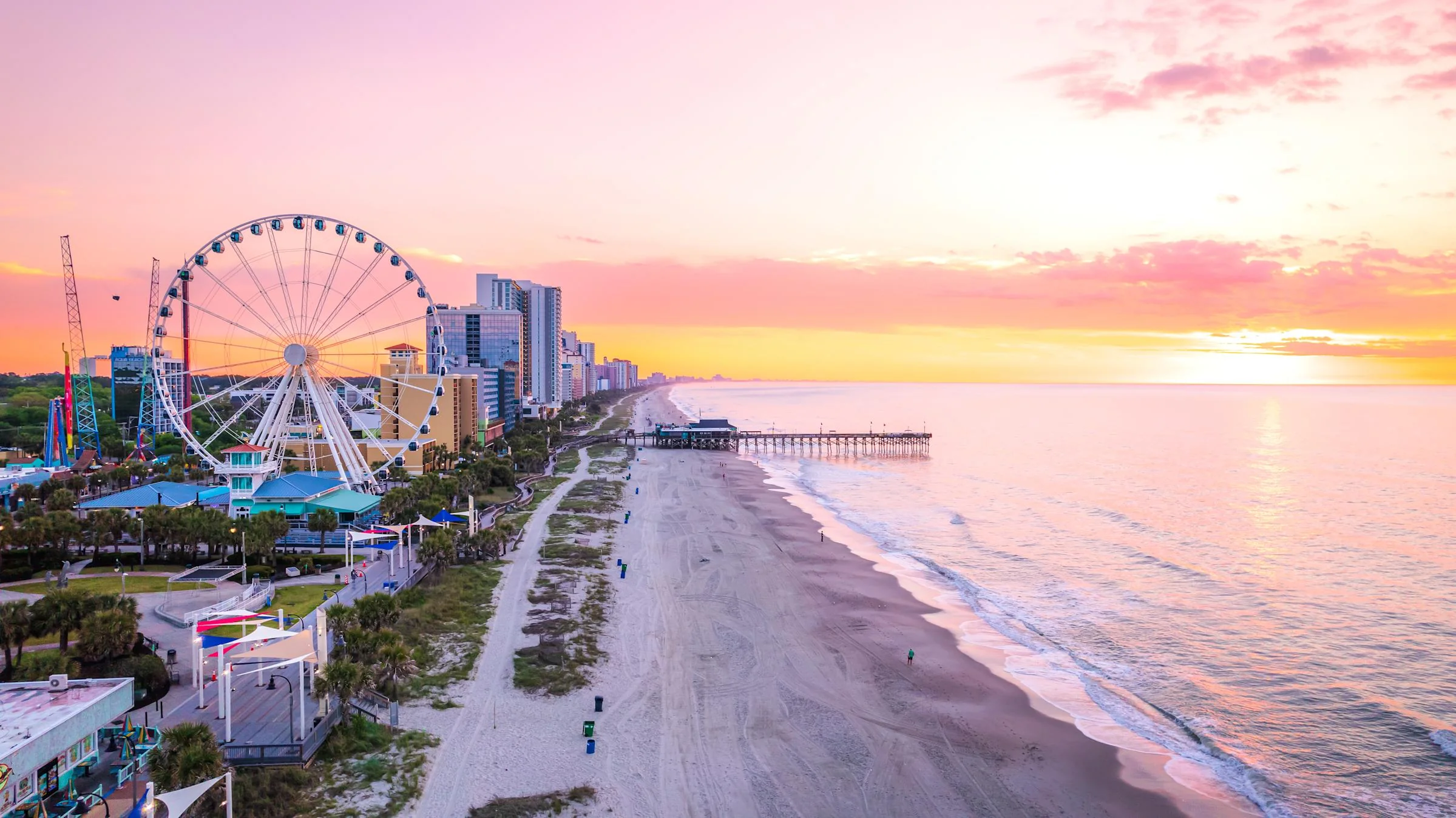 Myrtle Beach combines miles of free public shoreline with a lively boardwalk, making it easy for families to plan affordable beach days.