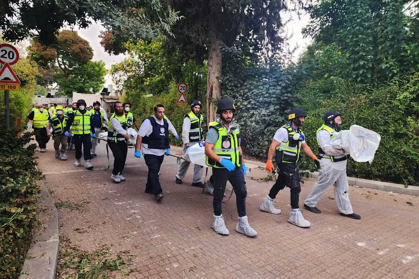 Volunteers from the Orthodox Jewish organisation Zaka remove bodies for burial after the October 7 2023 attack by Hamas © Zaka