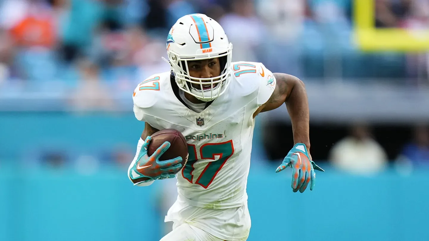 Jaylen Waddle (17) of the Miami Dolphins runs the ball against the New York Jets during the second half at Hard Rock Stadium in Miami Gardens, Florida, on Dec. 17, 2023. (Rich Storry/Getty Images)
