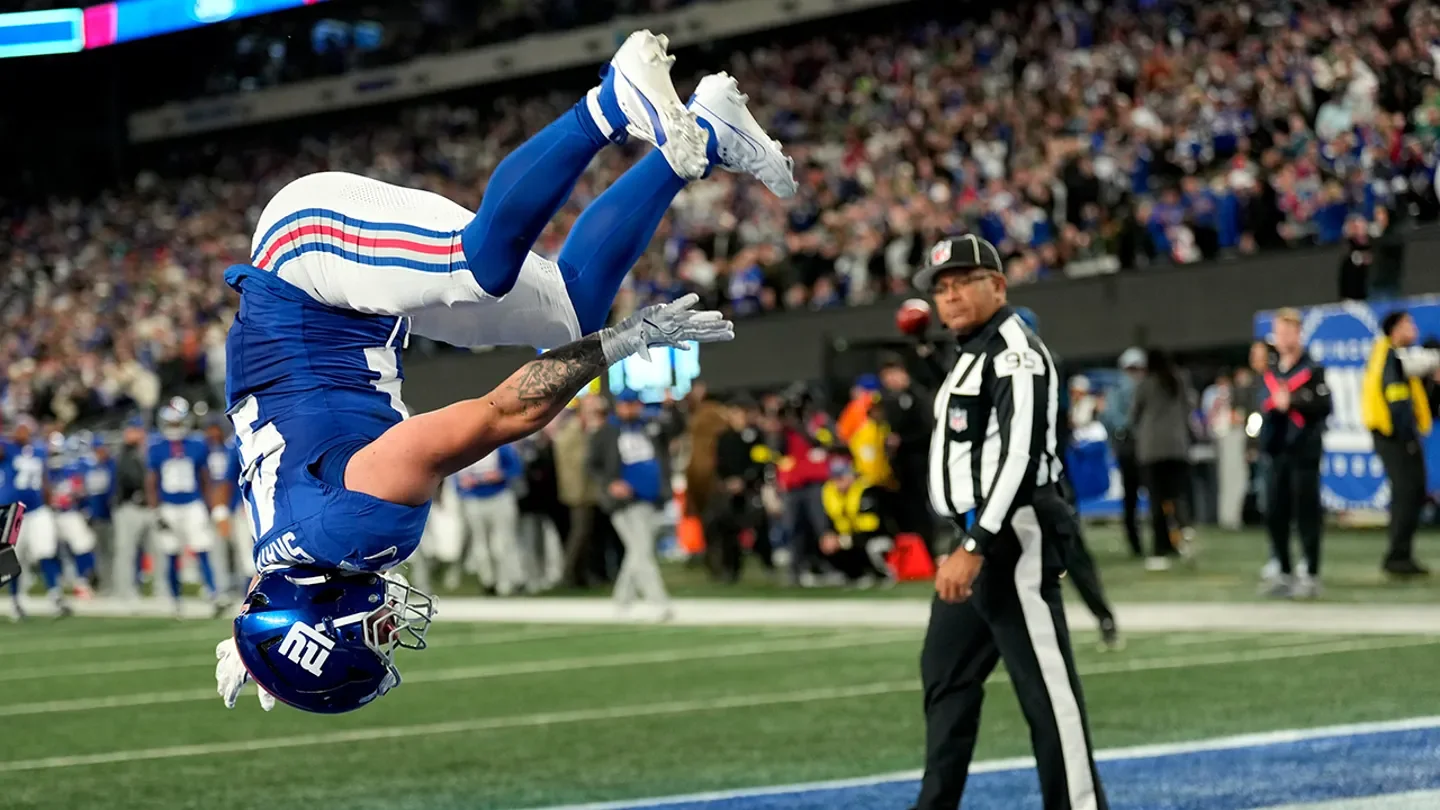 The New York Giants' Cam Skattebo reacts after a touchdown during the second half against the Philadelphia Eagles Oct. 9, 2025, in East Rutherford, N.J. (AP Photo/Seth Wenig)