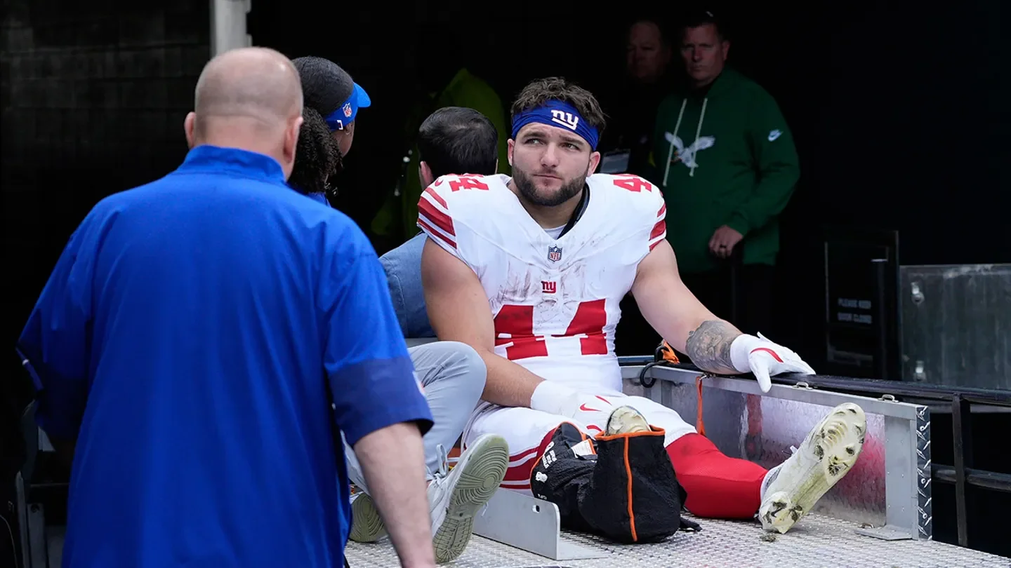 New York Giants running back Cam Skattebo leaves the field after being injured during the first half against the Philadelphia Eagles Oct. 26, 2025, in Philadelphia. (AP Photo/Chris Szagola)