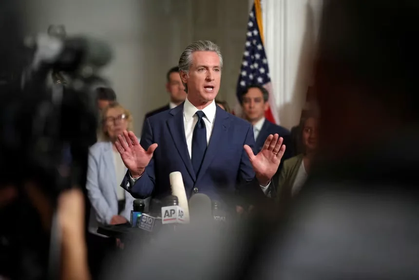 California Gov. Gavin Newsom speaks at a press conference, accompanied by Texas Democratic legislators, at the governor’s mansion in Sacramento on August 8. Carlos Barria/Reuters