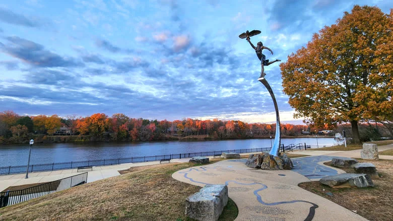 Fall colors by the river walk in the River Walk Park - Tyler Hadeen/Shutterstock