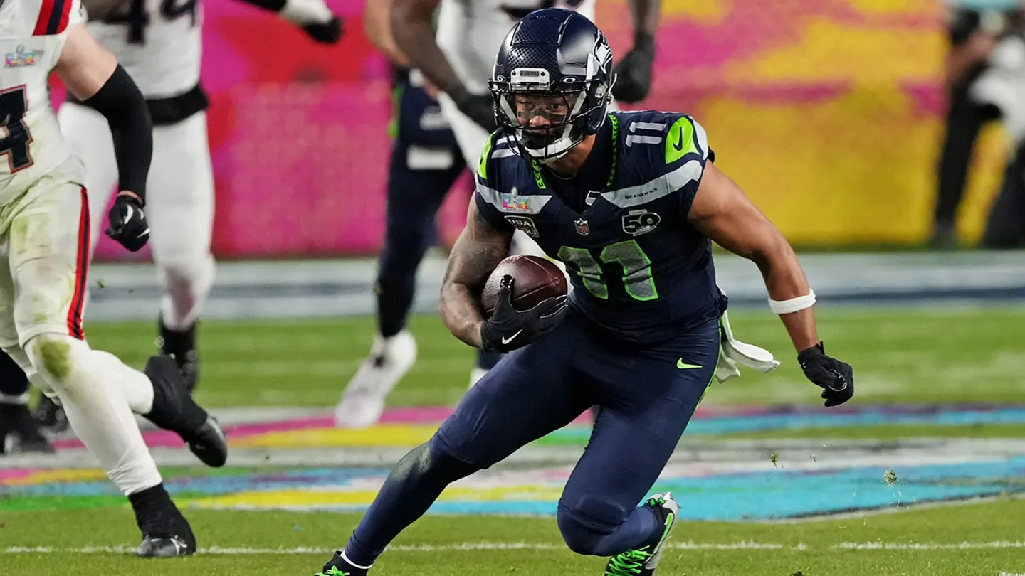 Seattle Seahawks wide receiver Jaxon Smith-Njigba runs the ball against the New England Patriots in Super Bowl LX at Levi's Stadium on Feb. 8, 2026. (Cary Edmondson/Imagn Images)