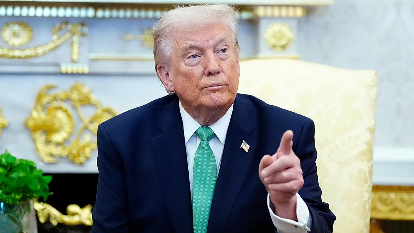 President Donald Trump takes questions from reporters during a meeting with Irish Prime Minister Micheál Martin in the Oval Office of the White House, on St. Patrick's Day, Tuesday, March 17, 2026, in Washington.  (AP Photo/Alex Brandon)