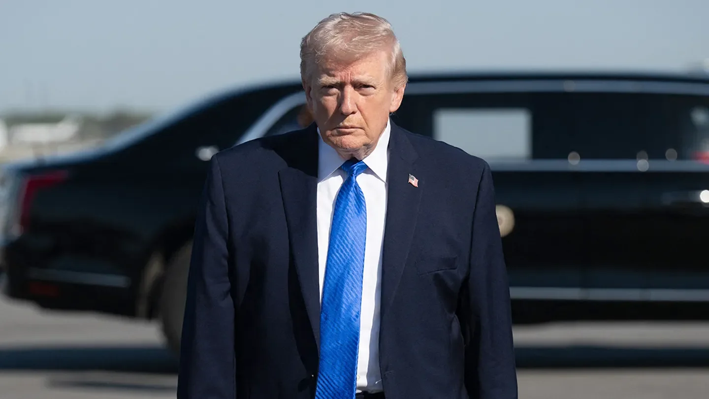 President Donald Trump walks to speak to reporters before boarding Air Force One at Palm Beach International Airport in West Palm Beach, Florida, on March 23, 2026. (SAUL LOEB / AFP via Getty Images)