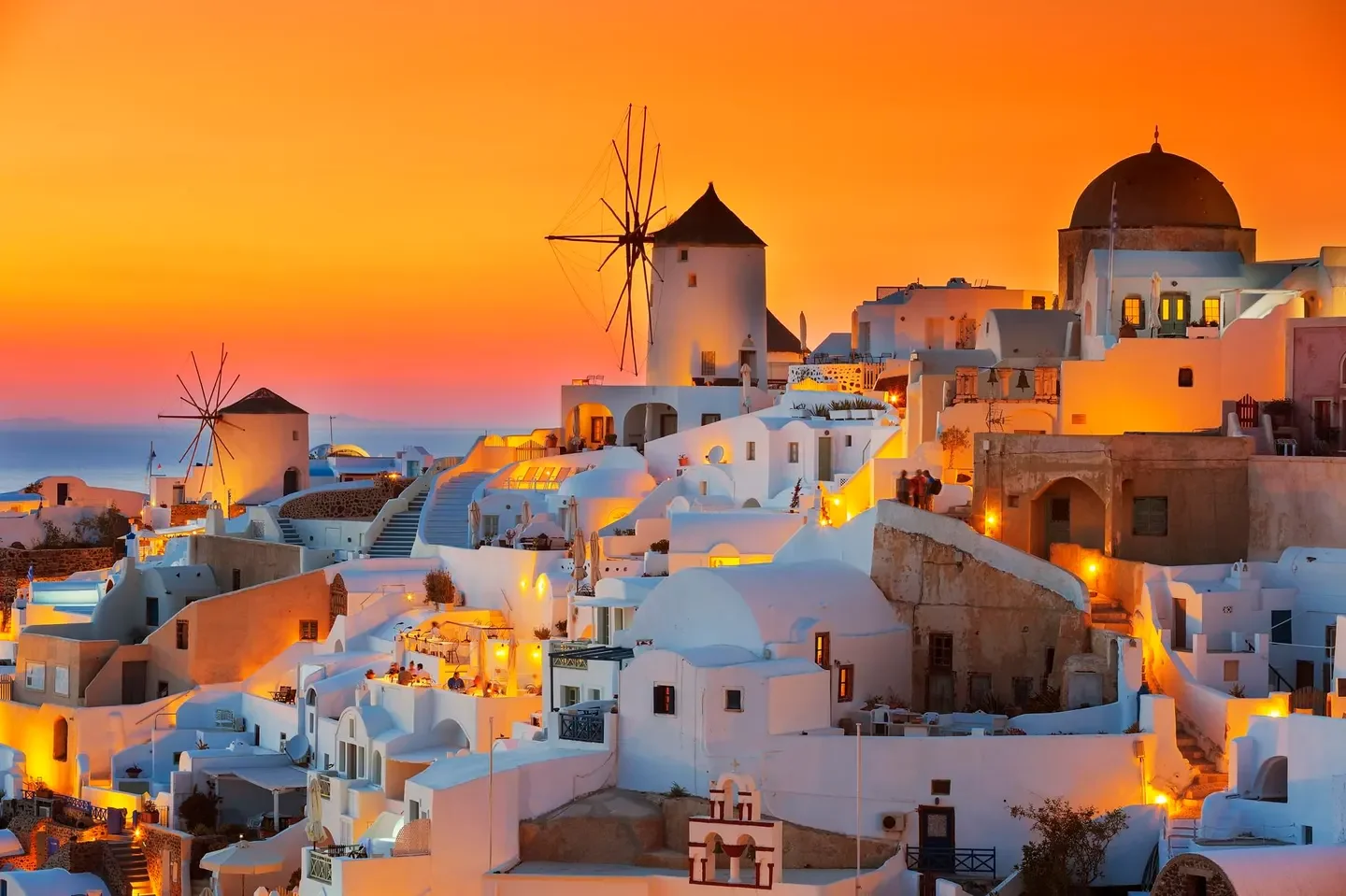 Oia at sunset, Santorini getty