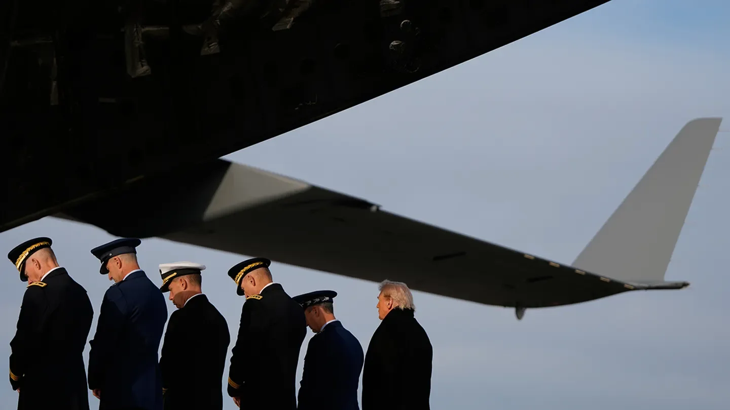President Donald Trump arrives to watch as carry teams move the transfer cases with the remains of Iowa National Guard soldiers Sgt. William Nathaniel Howard, 29, of Marshalltown, Iowa, and Sgt. Edgar Brian Torres-Tovar, 25, of Des Moines, Iowa, and civilian interpreter Ayad Mansoor Sakat, who were killed in an attack in Syria, during a casualty return, Wednesday, Dec. 17, 2025 at Dover Air Force Base, Del. (Julia Demaree Nikhinson/AP Photo)