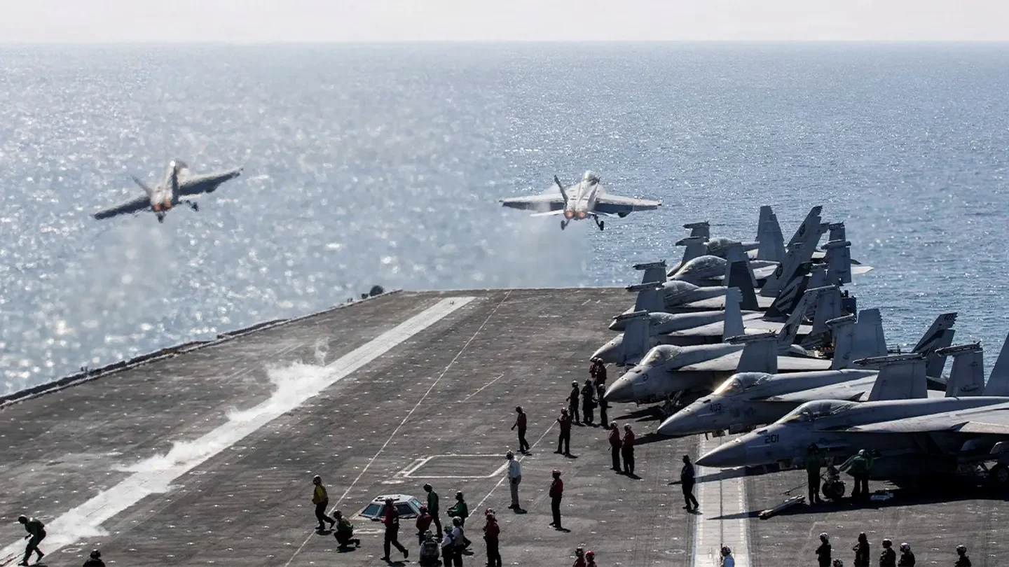 Two F/A-18 Super Hornets launch from the flight deck of the U.S. Navy Nimitz-class aircraft carrier USS Abraham Lincoln in support of the Operation Epic Fury attack on Iran from an undisclosed location March 3, 2026. (U.S. Navy/Handout via Reuters)