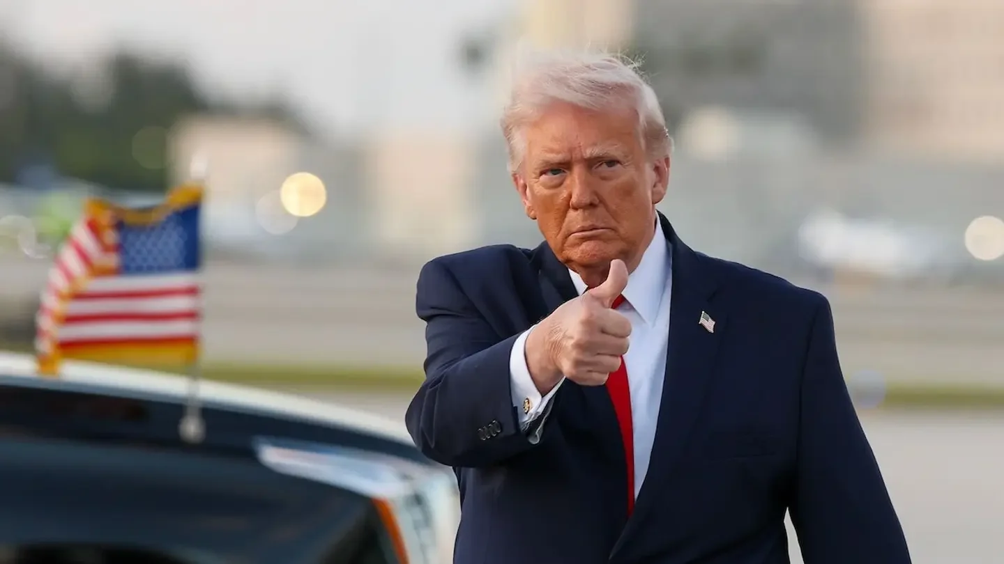 President Donald Trump flashes a thumbs-up. (Tasos Katopodis/Getty Images)