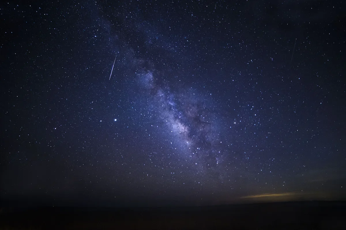 A Lyrid meteor crosses the Milky Way galaxy in this photo taken by Tina Pappas Lee on Fripp Island, South Carolina. The photo was taken at approximately 4:45 a.m. local time on April 22, 2020. (Image credit: Courtesy of Tina Pappas Lee)