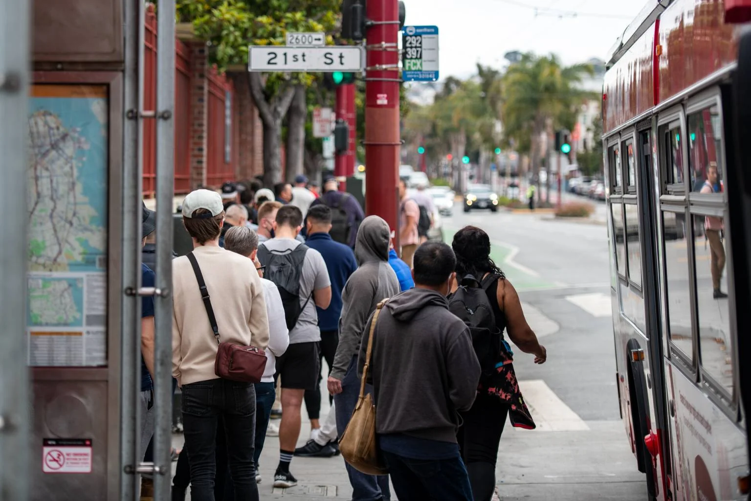 Hundreds of people wait in a walk-in line for an mpox vaccine at Zuckerberg San Francisco General Hospital on Monday, Aug. 1, 2022. (Beth LaBerge/KQED)