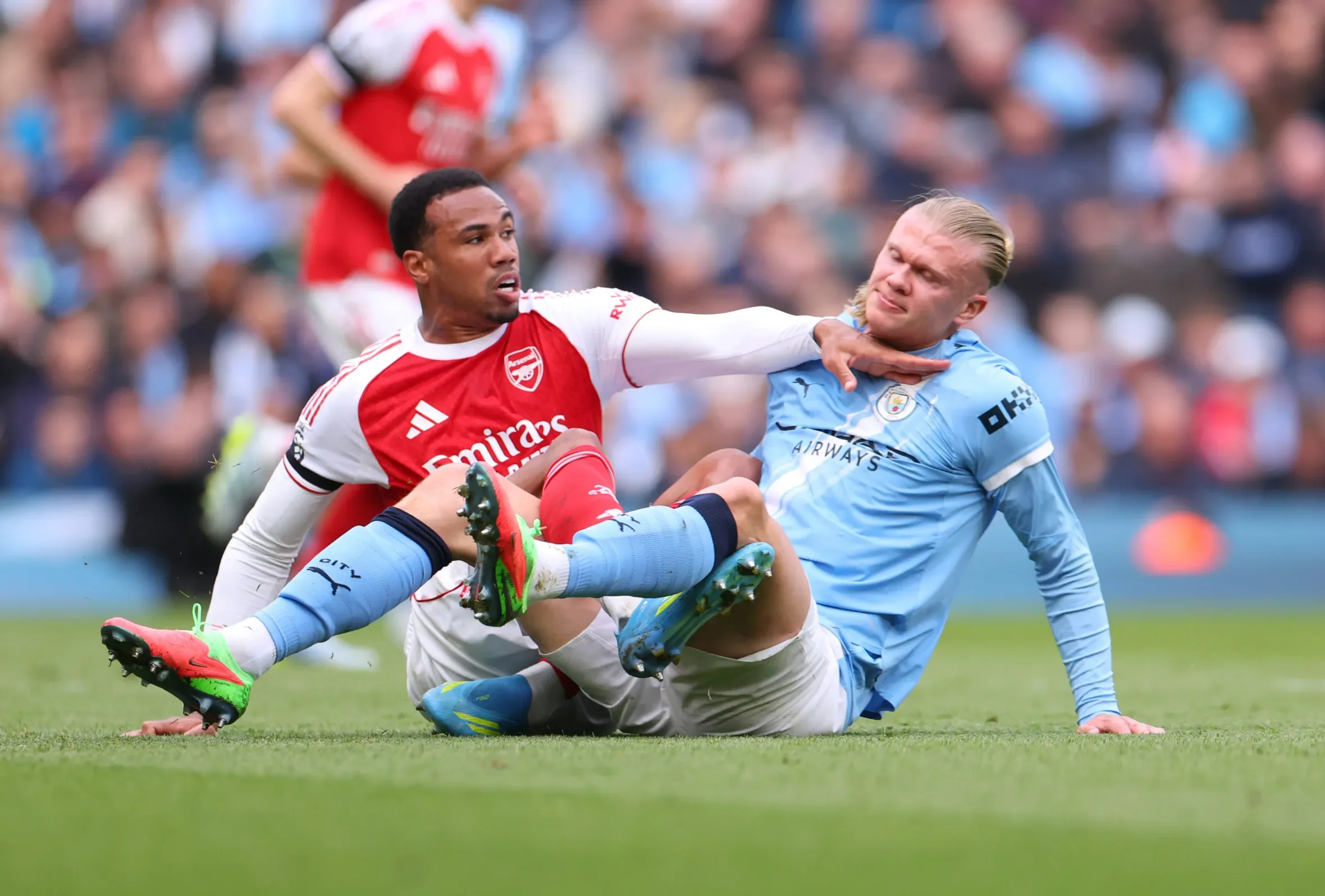 Arsenal's Gabriel Magalhaes (left) marks Manchester City's Erling Haaland during the Premier League match at the Etihad Stadium, Manchester. Picture date: Sunday April 19, 2026. (Photo by Martin Rickett/PA Images via Getty Images)Photo by Martin Rickett/PA Images via Getty Images