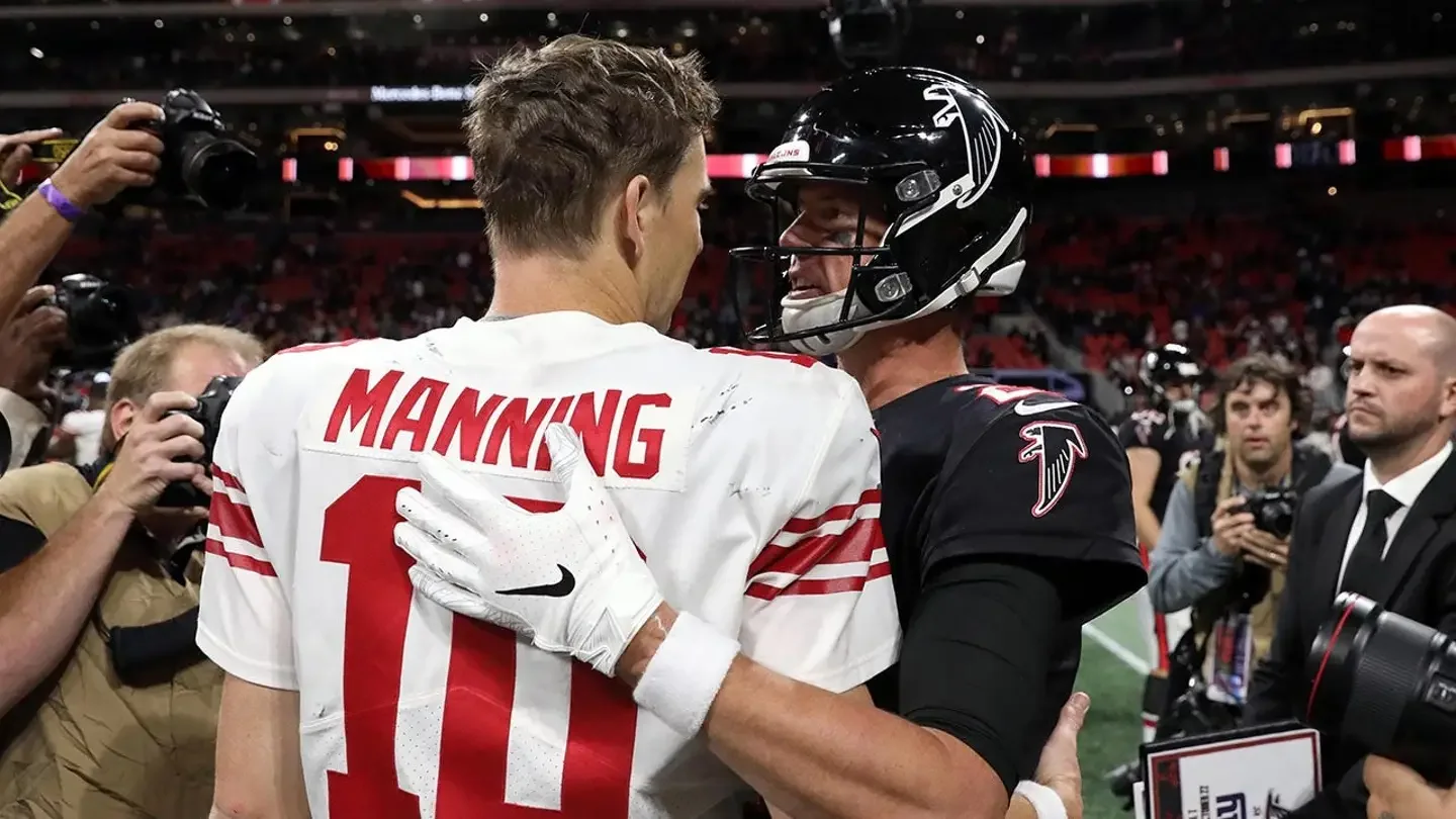 New York Giants quarterback Eli Manning greets Atlanta Falcons quarterback Matt Ryan after their game at Mercedes-Benz Stadium in Atlanta, Georgia, on Oct. 22, 2018. (Jason Getz/USA TODAY Sports)
