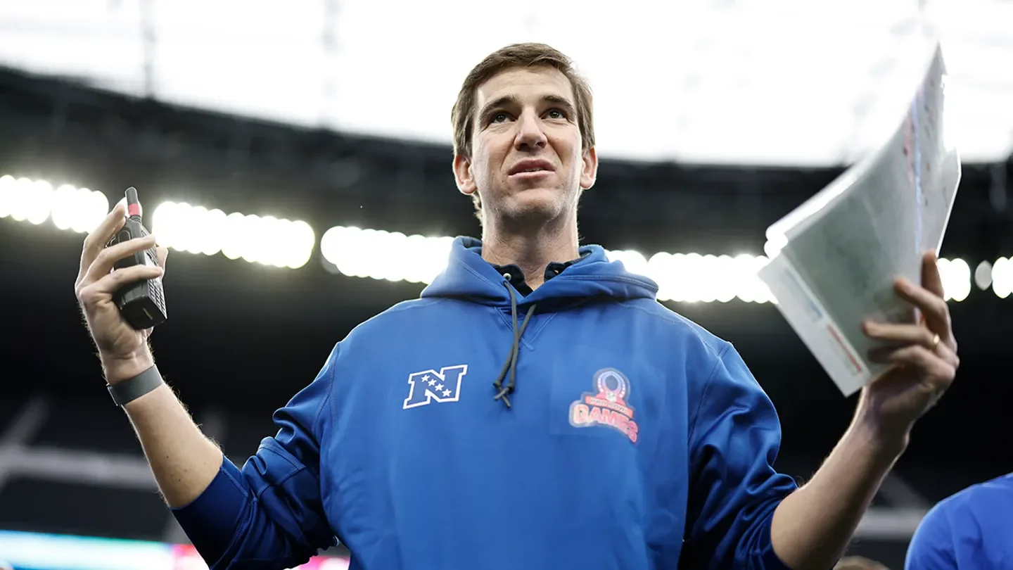 NFC head coach Eli Manning leads a huddle during a practice session before the NFL Pro Bowl at Allegiant Stadium in Las Vegas, Nev., on Feb. 4, 2023. (Michael Owens/Getty Images)