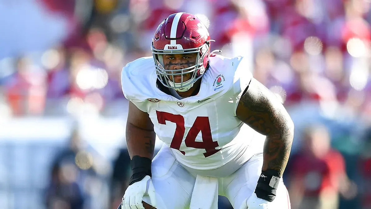 OL Kadyn Proctor of the Alabama Crimson Tide looks on during the CFP Semifinal game against the Michigan Wolverines at the Rose Bowl Stadium in Pasadena, Calif., on Jan. 1, 2024. (Brian Rothmuller/Icon Sportswire)
