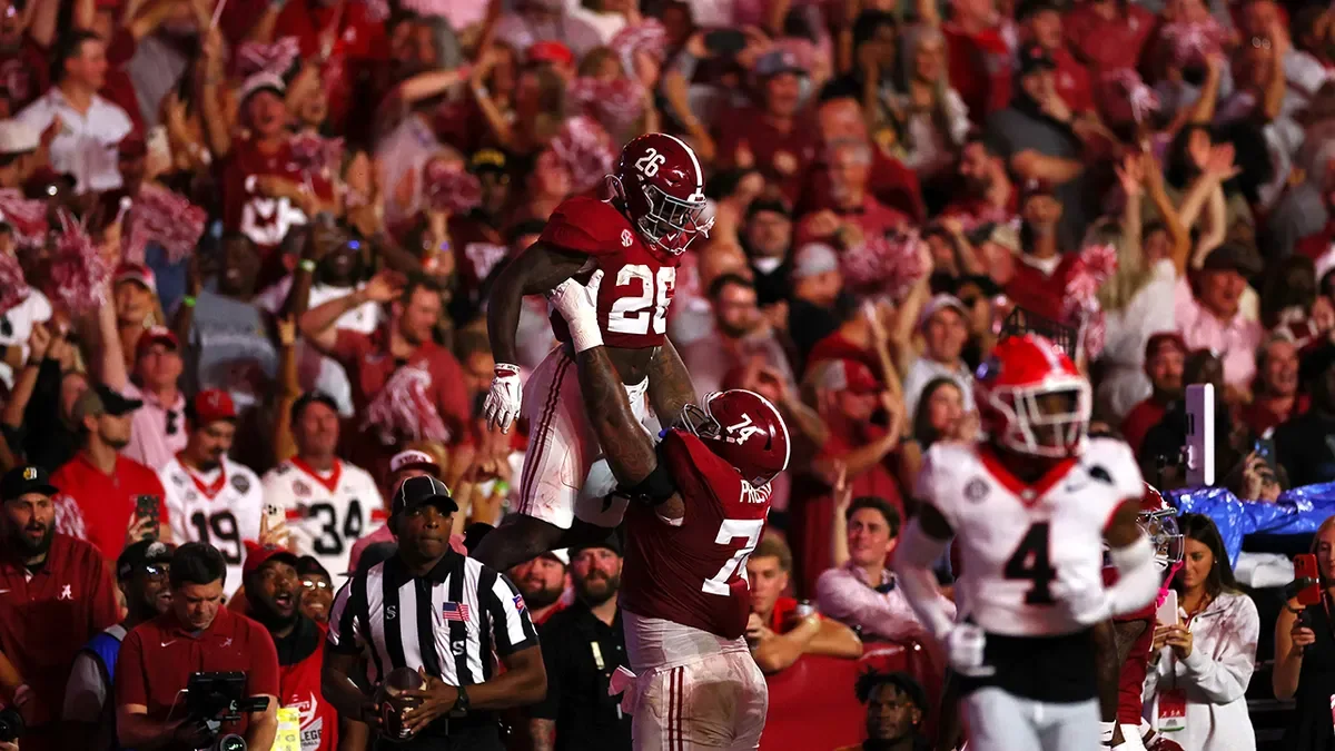 Jam Miller of the Alabama Crimson Tide celebrates his receiving touchdown with Kadyn Proctor during the first quarter at Bryant-Denny Stadium in Tuscaloosa, Ala., on Sept. 28, 2024. (Kevin C. Cox/Getty Images)