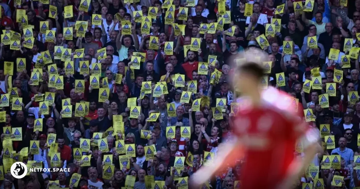 Liverpool fans staged a coordinated protest at Anfield against ticket price hikes, using yellow cards to warn the club's owners during the Crystal Palace match.