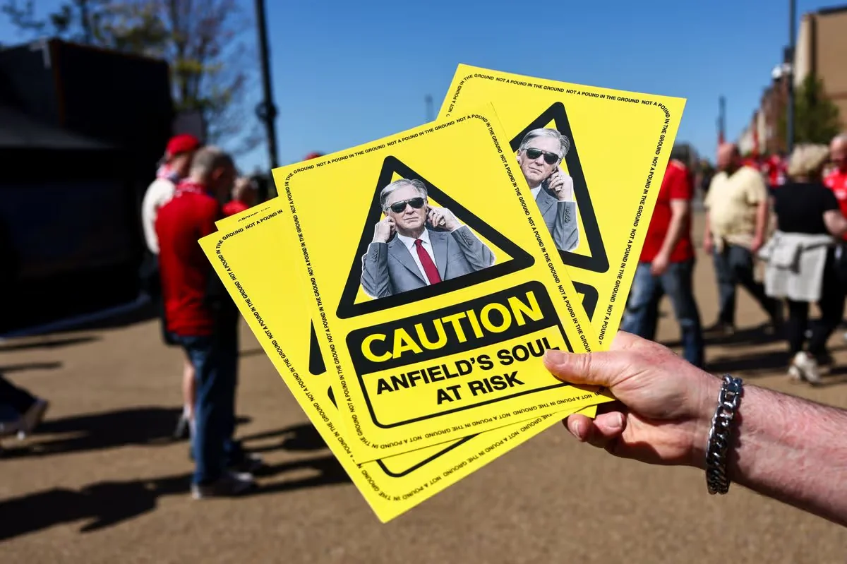 Yellow cards that Liverpool supporters raised in the 13th minute against Crystal Palace(Image: (Robbie Jay Barratt - AMA/Getty Images))