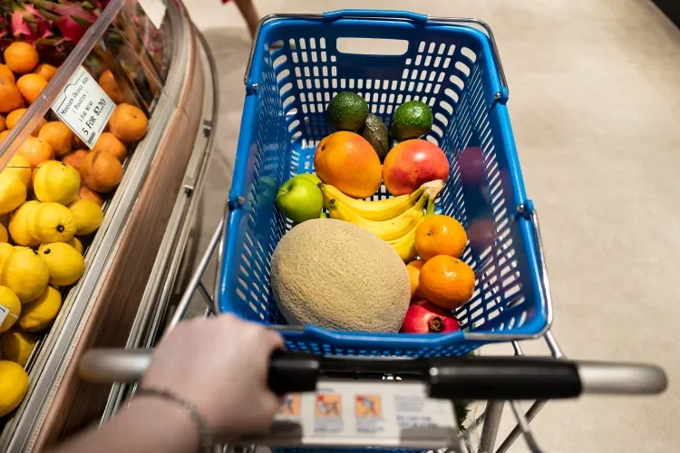 Stock image of a grocery basket full of produce. Credit : Getty