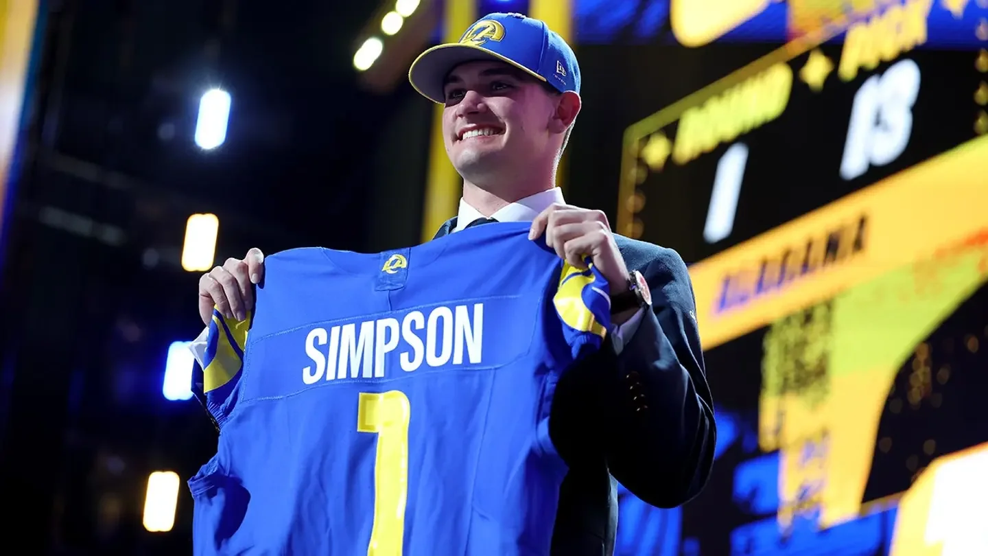 Ty Simpson of Alabama celebrates after being selected as the 13th overall pick by the Los Angeles Rams during the first round of the 2026 NFL Draft at Acrisure Stadium in Pittsburgh, Pennsylvania, on April 23, 2026. (Emilee Chinn/Getty Images)