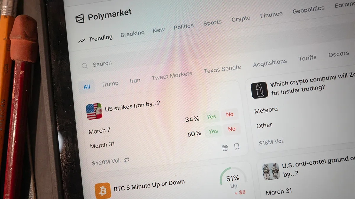 The Polymarket app is shown on a smartphone in Chicago on Feb. 25, 2026. Polymarket is an online prediction market platform. (Scott Olson/Getty Images)