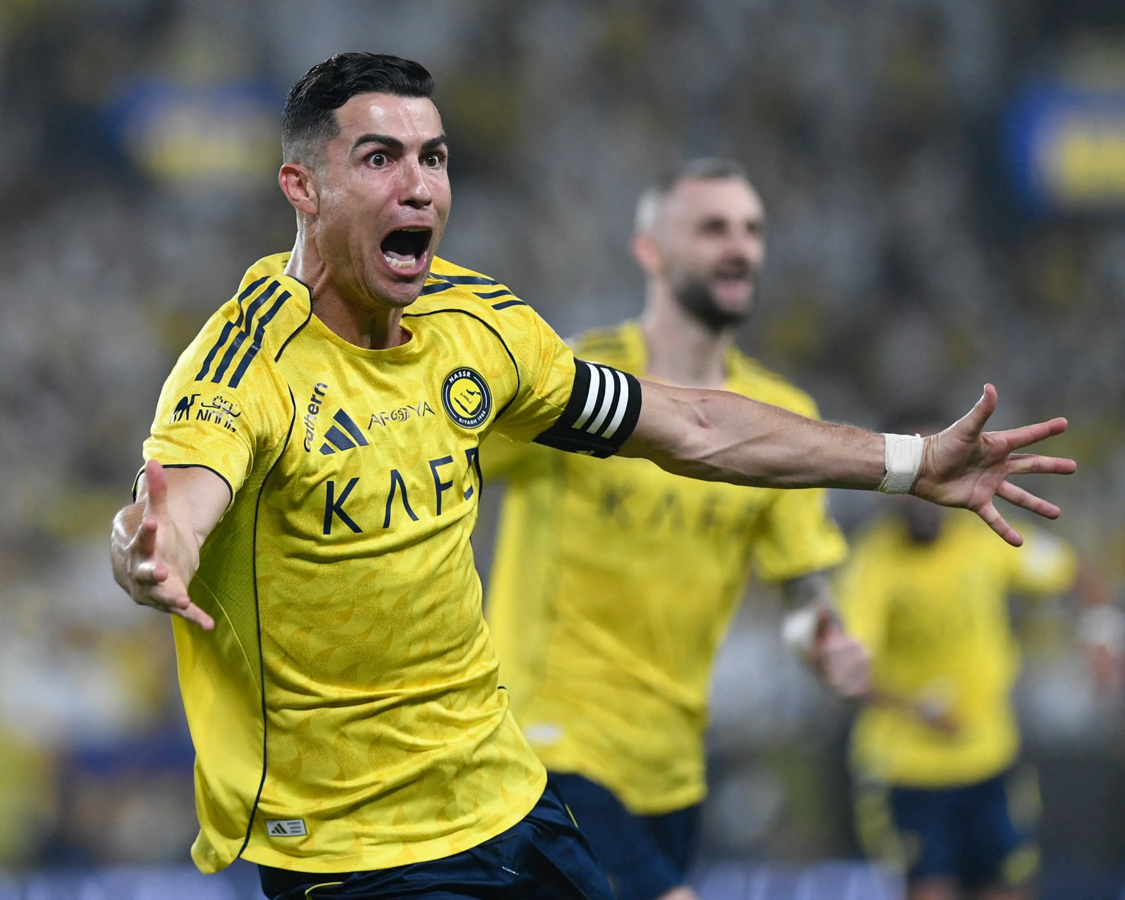 Cristiano Ronaldo wheels away after scoring against Al-Ahli in late April – the Portuguese veteran has 25 league goals this season. Photograph: Reuters