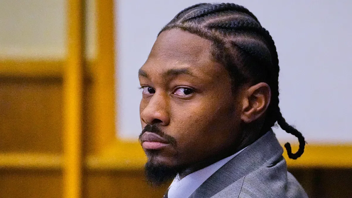 Former New England Patriots wide receiver Stefon Diggs listens to his defense attorney cross-examine a witness during his trial at Norfolk County District Court in Dedham, Mass., on May 5, 2026. (Charles Krupa/AP)